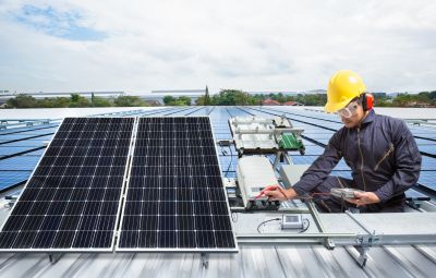 Technician Connecting Solar System